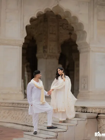 The timeless beauty of heritage sites offers a story of its own. In this pre-wedding shoot at a Delhi fort, I used the classic arches and stone steps to frame the couple, creating an image of elegance and enduring love.