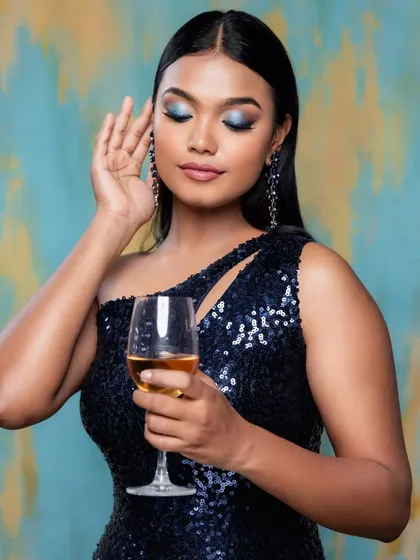 This video showcases how the blue dangling earrings move and sparkle, making them a perfect accessory for a night of dancing.