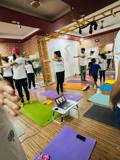 A candid shot of our group class in session. The sense of community and shared purpose is what makes practicing together so special.