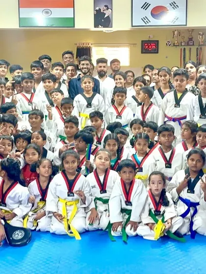 Our students with their families after a belt exam. This is a journey we take together.