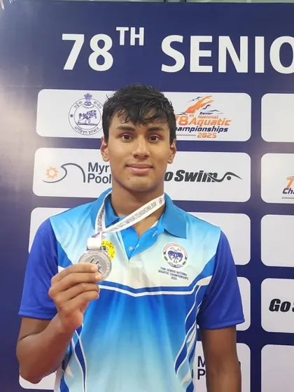 Utkarsh Patil with his silver medal from the men's medley relay.