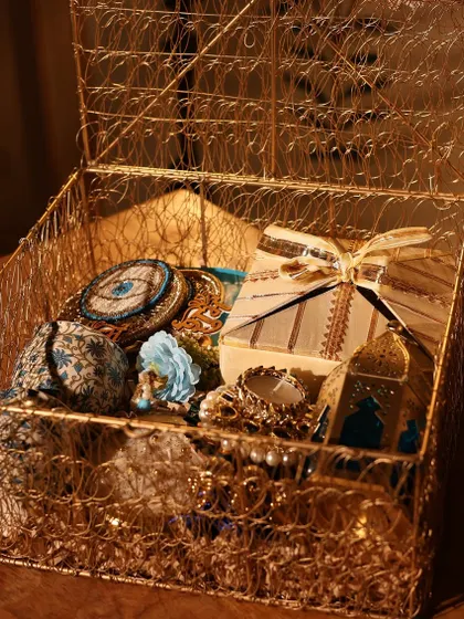 The golden wire box hamper, perfect for creating a treasure trove of festive surprises.