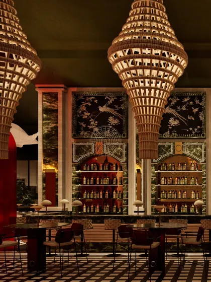 The bar at Koko Hyderabad was designed to be a work of art, featuring massive custom bamboo light fixtures, hand-painted Asian scenery, and a stunning green marble top.