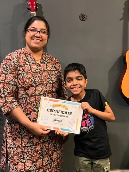 We're so proud of Reuben, seen here with his mother, holding his certificate of participation. His dedication during the workshop was truly inspiring to see.
