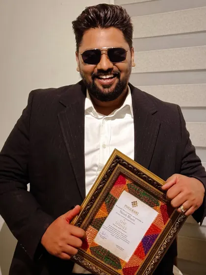 Holding a certificate of appreciation from Phulkari. Women empowerment is a theme I am passionate about, and it was an honor to showcase the inspiring journey of this organization.
