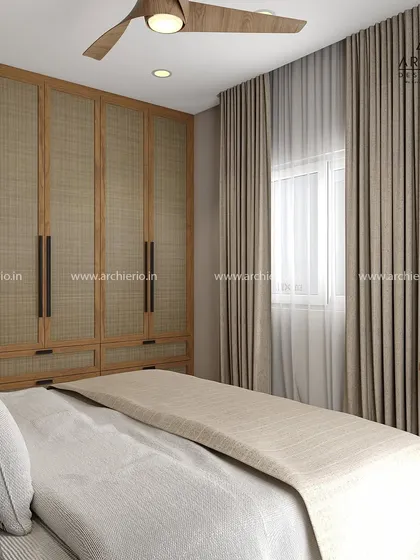 This custom wardrobe uses natural cane webbing on the doors to bring a warm, earthy, and bohemian feel to the bedroom. The design is both trendy and timeless.