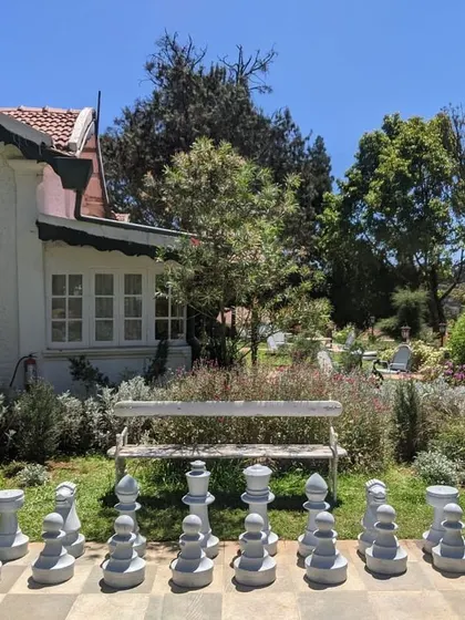 The outdoor chess set provides a unique recreational amenity for hotel guests.