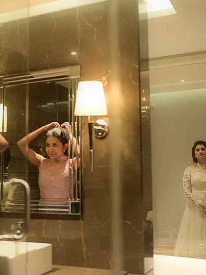 A glimpse into the getting-ready process in a beautiful hotel suite.