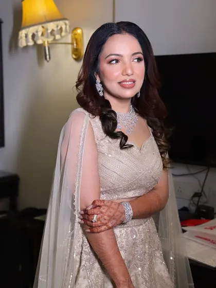 A happy and confident client, ready for her engagement party. The makeup is designed to be long-lasting and photo-ready.