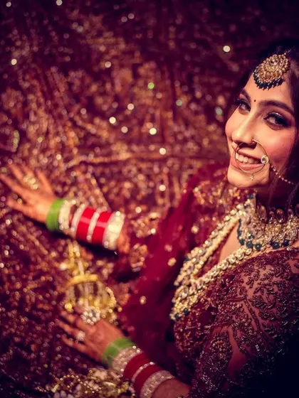 A fun and happy bridal portrait, capturing a candid moment of laughter.