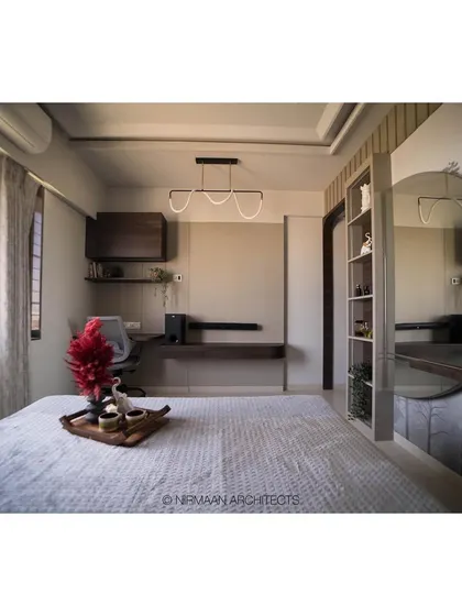 A wide view of the master bedroom with an integrated study and dressing area. The design ensures that every square foot is used effectively without compromising on style or comfort.