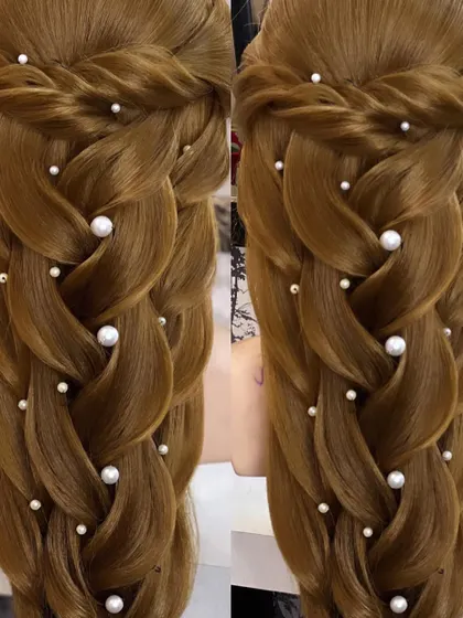 A close-up of the advanced open hairstyle, showing the intricate weaving.