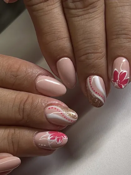 The full set, showing how the different accent nails come together for a cohesive, artistic manicure.
