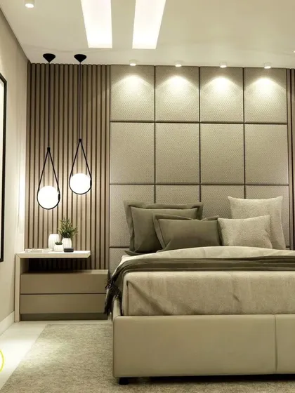 Another angle of the same bed, showing the elegant pendant lights.
