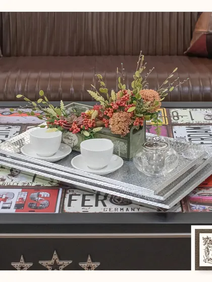 This set of three rectangular serving trays features a hammered silver finish. They are perfect for serving guests or for organizing and displaying decorative items on a coffee table.