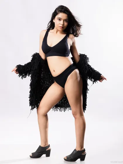 A full-body shot from a different angle, showing the complete look.