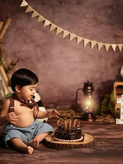 Let the wild rumpus start! A first birthday cake smash is a wonderfully messy and fun way to mark a major milestone. We customize every detail, like this jungle adventure theme, to bring your vision to life.