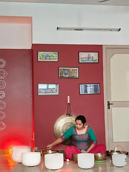 A student practices with both crystal and Tibetan singing bowls during her Level 1 course. This hands-on approach ensures our graduates are confident with all the primary tools of sound meditation.