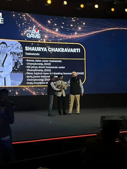 Shaurya Chakravarti being felicitated on stage at the iAMGame Sports Conclave. This recognition by the wider sports industry is a proud moment for our academy.