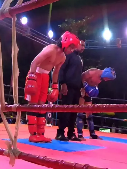 The referee gives the final decision. We are proud of the silver medal performance.