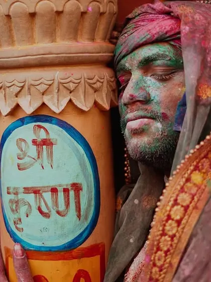 A vibrant collection of images from the Holi celebrations in Braj, specifically Nandgaon. This series captures the pure ecstasy of the festival, with portraits of devotees, men dressed as gopis, and crowds dancing in a cloud of colors.