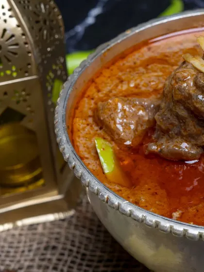 A close-up of our Nalli Nihari, showcasing the tender meat falling off the bone into a rich, spicy gravy. It's the ultimate comfort food.