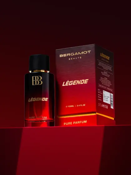 A hero shot for Bergamot Beaute's "Legende" perfume. We used a special lighting projector to create a dramatic pattern, enhancing the bottle's bold design against a rich red backdrop.
