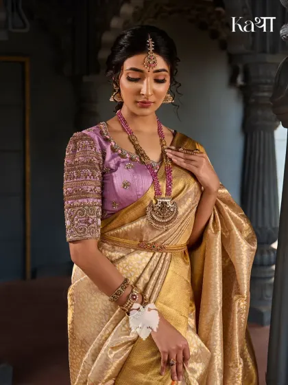 The Janaki Rama blouse, showcasing the quiet grace of their divine bond. The heavily embroidered sleeves contrast beautifully with the subtle elegance of the body.