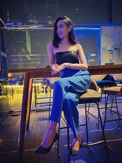 Taking a moment during a party I hosted at a stylish lounge. I believe in living the life I dreamt of, and that passion shines through in my work.