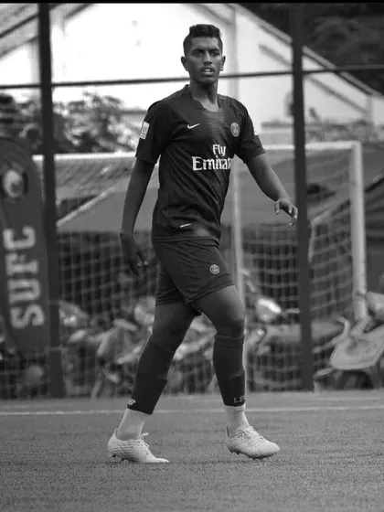A classic black and white shot of Stalin, capturing his focus and presence on the field.