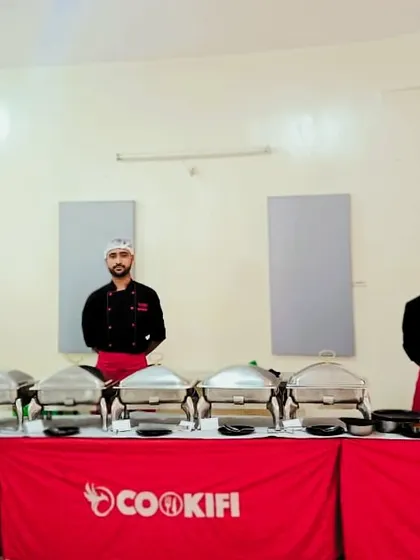 Our staff ready to welcome guests to a house party, ensuring a professional and organized catering experience.