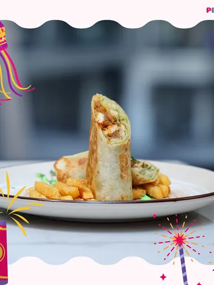 Our delicious shawarma wrap, packed with flavor and served with a side of fries. A must-try from our cafe menu.