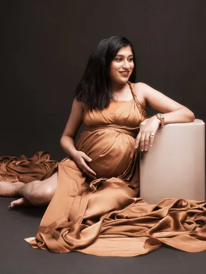 When elegance meets emotion. A timeless portrait in a golden-brown gown, tailored to be intentional and beautiful.