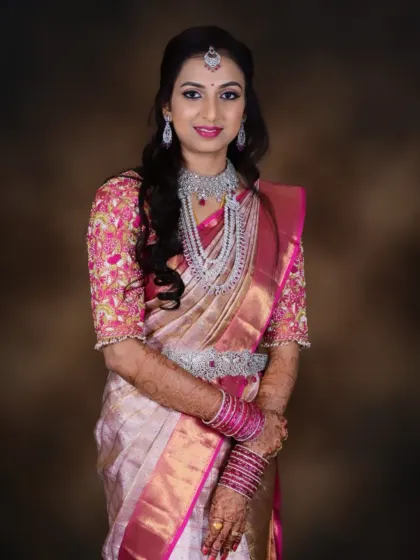A full view of the elegant reception look. The soft, flowing hair and the flawless makeup base create a look of pure sophistication.