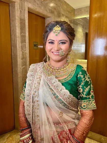 A beautiful portrait of the bride, looking happy and confident.