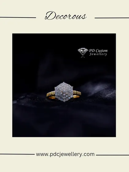 A beautiful hexagonal diamond cluster ring in 18kt gold. The unique shape and brilliant sparkle make this a modern and stylish choice for a cocktail ring.