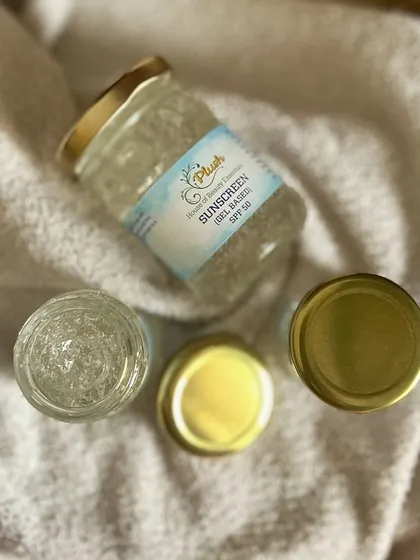 A top-down view of my SPF 50 gel sunscreen. You can see the lightweight, clear formula that glides onto the skin.