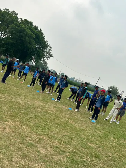 I am instructing the players during a fitness session. Discipline and attention to detail are important in every drill.