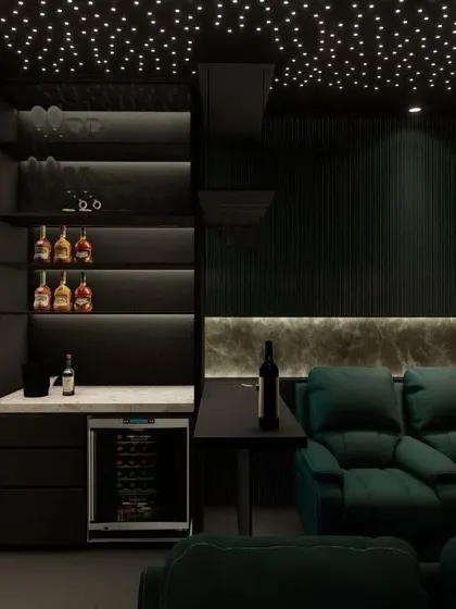 A fully stocked mini-bar with a wine fridge is the ultimate accessory for any entertainment space. I can integrate these features seamlessly into the design.