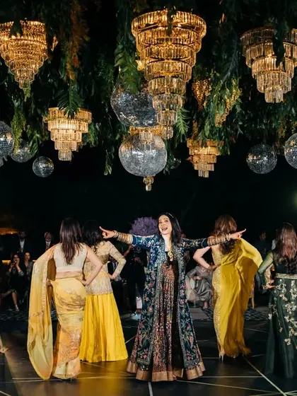 The groom's mother leading her friends in a fantastic group dance. Her energy is infectious.
