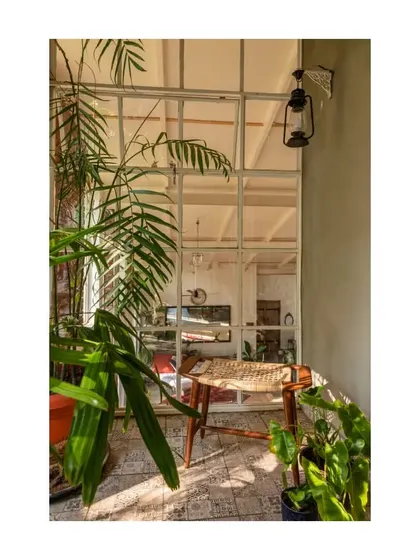 This view shows how we use internal windows and open railings to maintain visual connection between different areas of the home.