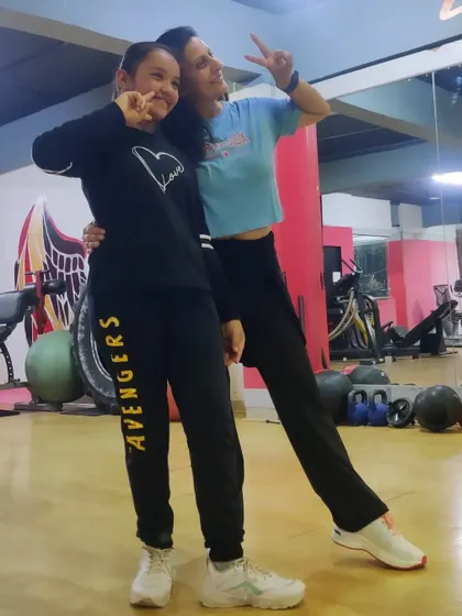 A fun pose with one of my younger students. It's amazing to see her confidence grow with every class.