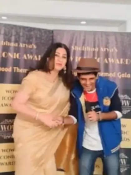 Sharing a laugh with the actress on the red carpet. My interactive style ensures that interviews are more like conversations, making them engaging for everyone.