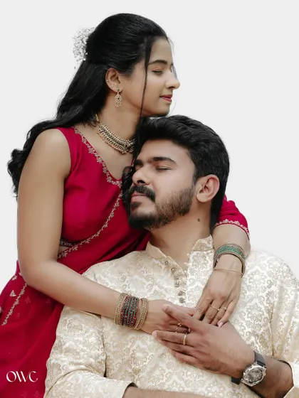 A serene and intimate moment with the couple embracing, their eyes closed in peaceful contentment.