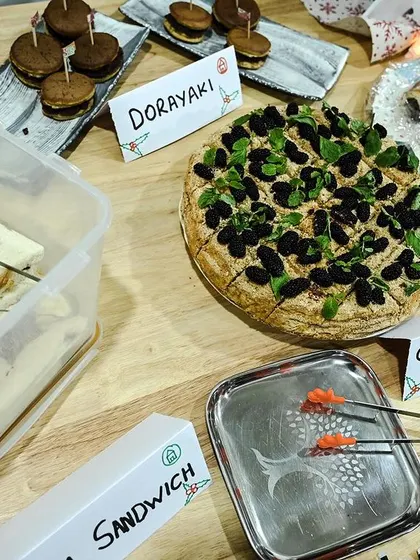 A delicious spread of desserts from our Christmas potluck, featuring treats from around the world.