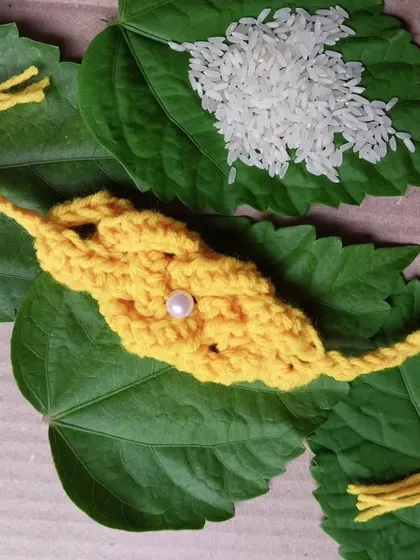 A unique, leaf-patterned crochet rakhi. I love experimenting with different shapes and styles.