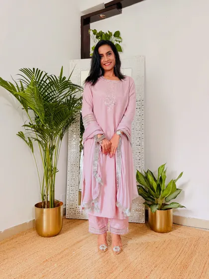 A beautiful pastel lilac festive suit from House of Pataudi on Myntra. The delicate detailing and soft color make it a very elegant choice for a special occasion.