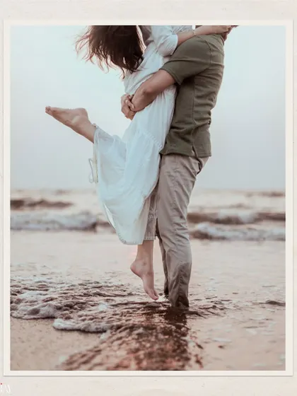A beautiful, emotional lift in the waves, capturing a moment of pure joy and connection.