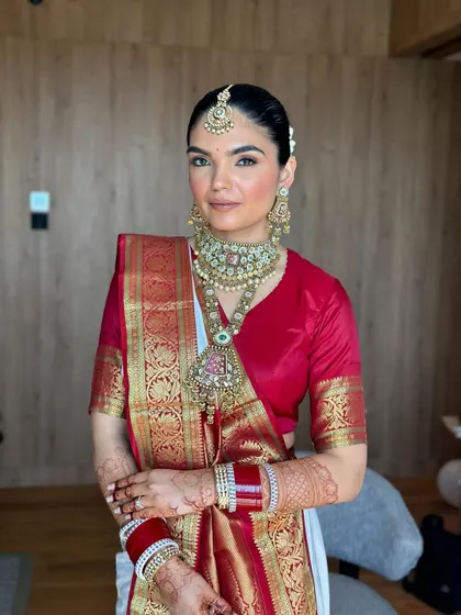 A classic bridal portrait. The makeup is meticulously applied to ensure it looks perfect from every angle and lasts all day.