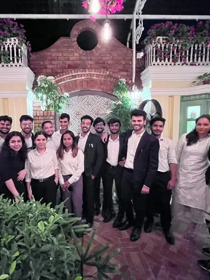 The team at an evening event. We work hard and believe in celebrating our successes together.